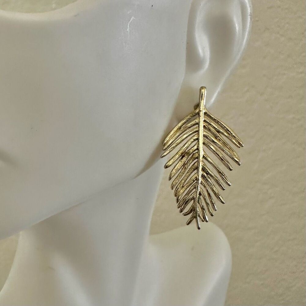 Gold tone palm leaf post earrings